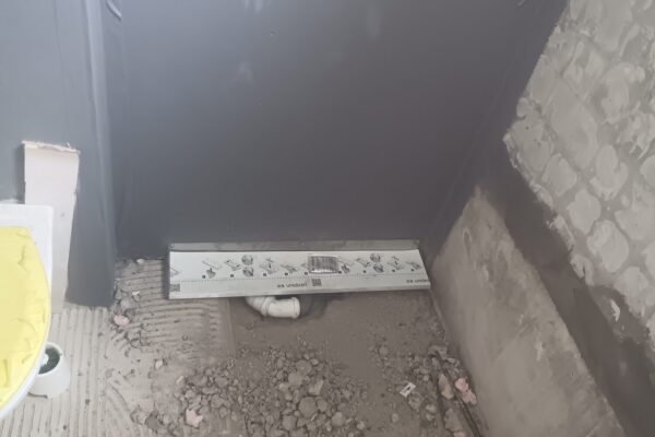 Uppsetning á sturtu niðurfalli fyrir "walk-in" sturtu